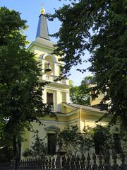 Holy Trinity Church in Helsinki with neoclassical architecture under clear sky