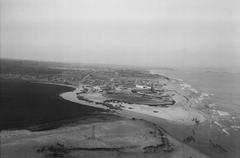 Aerial view of Tel-Aviv cityscape with dense buildings and coastline