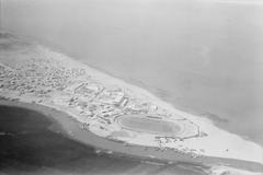Aerial view of Tel Aviv city showcasing urban landscape and coastline