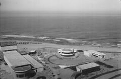 Aerial view of Tel Aviv cityscape featuring buildings and coastline