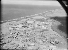 Aerial view of Tel Aviv cityscape showing urban buildings and coastline