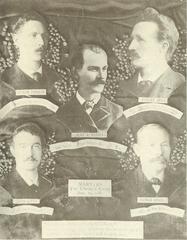 Faded historical photograph of The Haymarket Martyrs with quotes and names