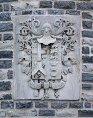 Coats of arms of Quebec City displayed on the Manège militaire de Québec facade