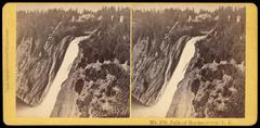 Falls of Montmorency waterfall in Quebec, Canada with surrounding forest and rocky cliffs