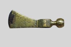 18th century iron and brass hatchet-head pipe from the Kanien’kehá:ka people