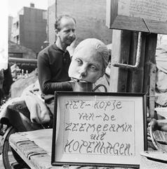 Street vendor at Waterlooplein market in Amsterdam selling goods in 1964