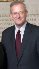 Portraits of Esther L. George and Thomas M. Hoenig, current and former Presidents of the Federal Reserve Bank of Kansas City