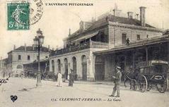 Historic train station in Clermont-Ferrand with passengers around 1909