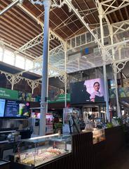 Valletta Food Market Is-Suq tal-Belt bustling with people and colorful stalls