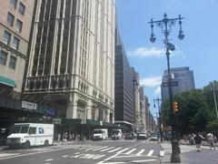 Traffic jam on Broadway with historic twin bracket lamppost visible
