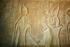 Ancient Egyptian tomb interior with hieroglyphic walls and pillars in KV15 Tomb of Seti II