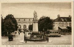 Old postcard showing the Monument aux Enfants de l'Aube on Avenue de la Gare with the New Train Station in Troyes