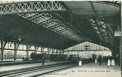 Vintage postcard showing the main hall of Troyes train station in France
