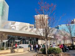 The World of Coca-Cola entrance in Atlanta GA with Coca-Cola logo and visitors