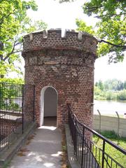 Baszta tower in Wrocław Zoo surrounded by greenery under a blue sky