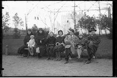Group of people sitting on a bench near hawks in the Warsaw Zoological Garden, featuring Zofia Witczak-Witaczyńska on the left and Barbara Witczak on the right
