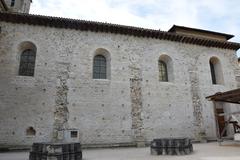 Abbaye de Cluny historic monastery exterior with stone arches and bell tower