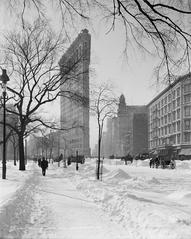 Flatiron Building corner covered in snow after a snow storm in New York City