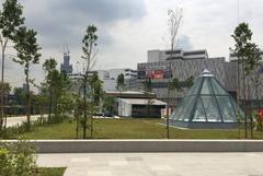 Station skylight and Entrance A at Jalan Cochrane with MyTown Shopping Complex in background