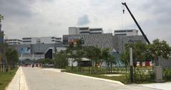 Ground level plaza view of Cochrane station with MyTown Shopping Complex in Kuala Lumpur