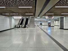 View of the concourse level of Tun Razak Exchange MRT station in Kuala Lumpur showing modern infrastructure and signage