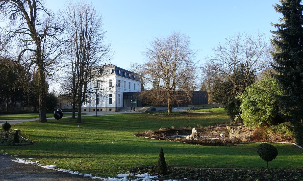 Villa Vauban Museum surrounded by lush trees and gardens in Luxembourg City