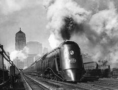 Streamlined New York Central Hudson steam locomotive Commodore Vanderbilt No.5344 pulling 20th Century Limited leaving Chicago LaSalle Street station