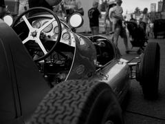 Formula 1 racing action at Brno Grand Prix revival event with speed and crowd excitement