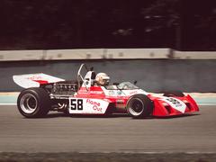 Formula 1 cars racing at the Brno Grand Prix circuit