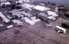 Aerial view of U.S. Naval Station Sangley Point showing U.S. Coast Guard Air Detachment with Grumman HU-16E Albatross aircraft