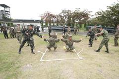 U.S. Marines from Fleet Anti-Terrorism Security Team Pacific training Philippine sailors and marines on vehicle assault aboard USS Blue Ridge