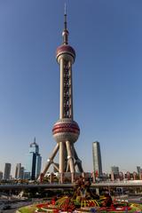 Oriental Pearl Tower in Shanghai at sunset with vibrant sky