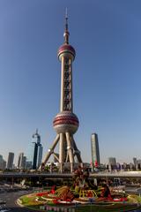 Oriental Pearl Tower in Shanghai at dusk with clear sky