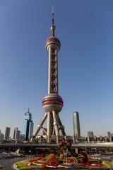 Oriental Pearl Tower in Shanghai at night with illuminated spheres and cityscape
