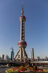 The Oriental Pearl Tower in Shanghai at night with city lights