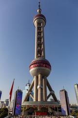 Oriental Pearl Tower in Shanghai at night with purple lighting