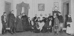 Scene from Act 4 of the comedy 'Schneider Wibbel' showing a mourning society in a cozy parlor