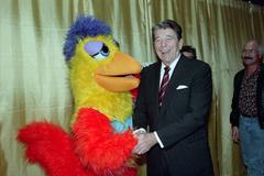 President Ronald Reagan posing with The Chicken mascot at the San Diego Convention Center California on November 7, 1988