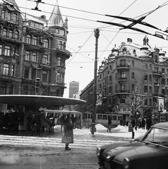 View of Stureplan and the intersection of Birger Jarlsgatan and Kungsgatan in Stockholm city with the iconic Svampen fountain on the left