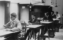 Edvin Engström sitting at his first workplace at Stureplan 13 in Stockholm in 1913