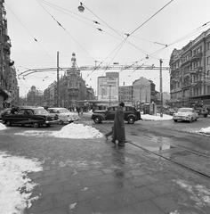 Stureplan intersection at Biblioteksgatan and Birger Jarlsgatan in central Stockholm city with urban buildings and traffic