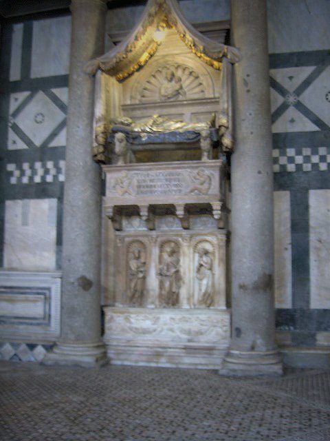 Florence Baptistery facade with ornate bronze doors and intricate architectural details