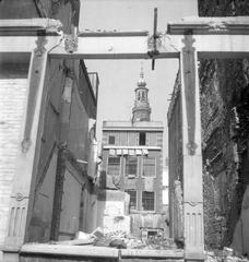 Historic black and white photograph of church demolition in Amsterdam by Emmy Andriesse