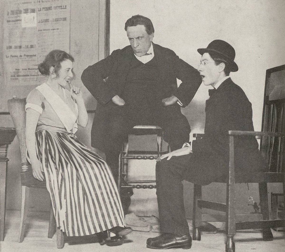 Scene from Act II of the Belgian comedy Le Cocu magnifique by Fernand Crommelynck featuring Régina Camier as Stella, Aurélien-Marie Lugné as Bruno, and Serge Plaute as scribe Estrugeon, photographed b
