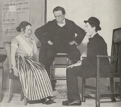 Scene from Act II of the Belgian comedy Le Cocu magnifique by Fernand Crommelynck featuring Régina Camier as Stella, Aurélien-Marie Lugné as Bruno, and Serge Plaute as scribe Estrugeon, photographed by Henri Manuel at Théâtre de l'Œuvre Paris 1921
