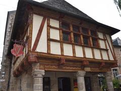 Old house in Dinan with stone walls and blue shutters