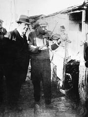 Carlos Gardel singing tango in Villa Desocupación, Retiro, Buenos Aires