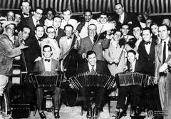 Carlos Gardel playing a bandoneón in 1933