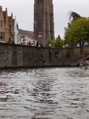 Summer view of Brügge cityscape with historic buildings and canals