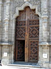 Close-up of wooden door in portal to Colegio Grande of San Ildefonso College Mexico City
